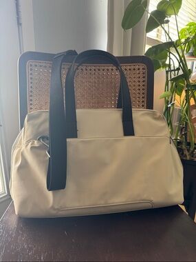 Away Cream Laptop Bag with Black Straps and Handles